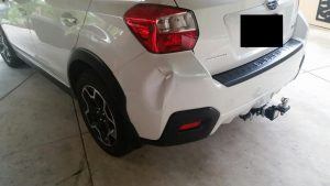 Pearl White bumper dent BEFORE a SMART repair